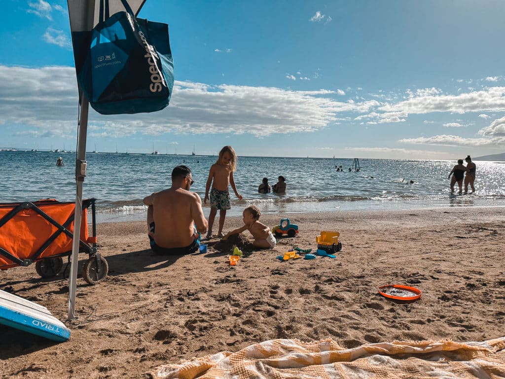 Family playing at Baby Beach Lahaina, Maui.