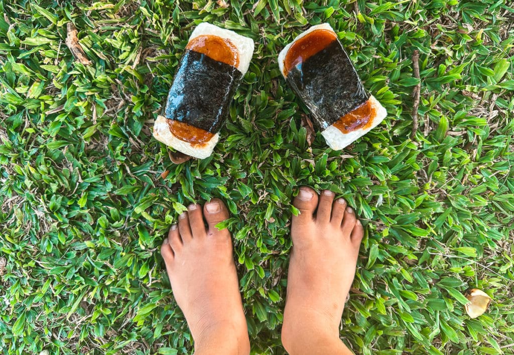 Toddler feet and a spam musubi.