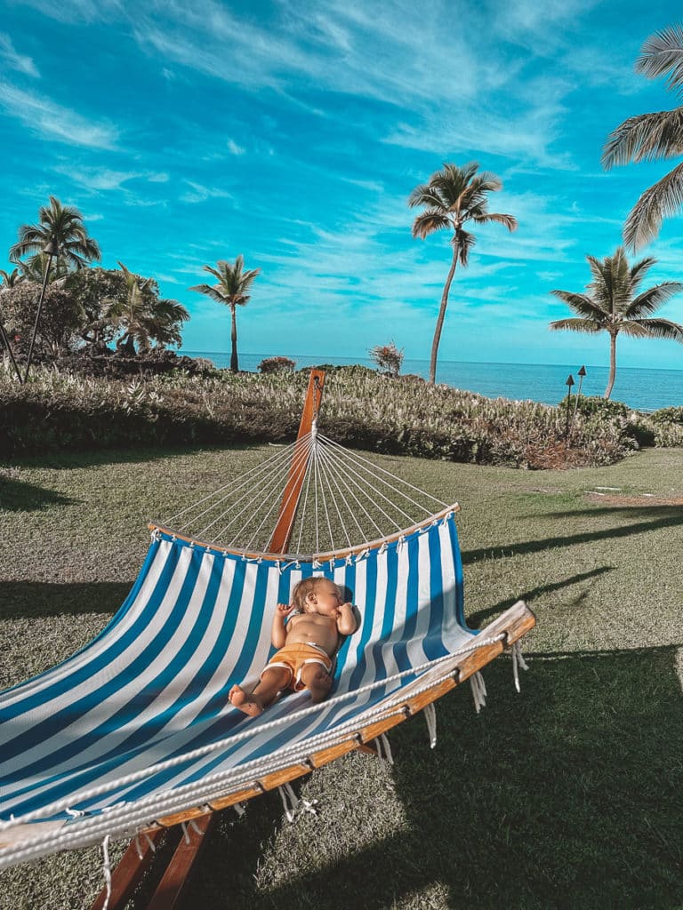 Baby laying in a hammock on the Big Island