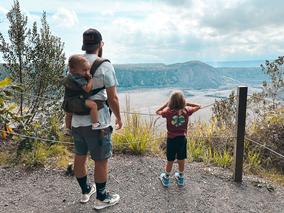 A dad and kids at Volcanoes National Park on the Big Island of Hawaii