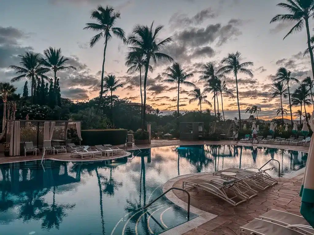 Adult pool at sunset at the Fairmont Kea Lani in Maui, Hawaii. 