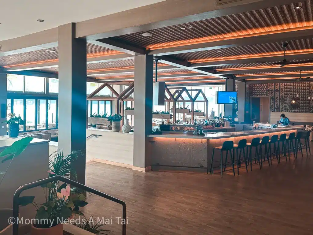 A wide view of a mostly empty Alaia Restaurant at Turtle Bay Resort, Oahu, Hawaii. 