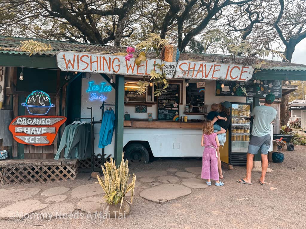 A family waiting in line for Wishing Well Shave Ice in Hanalei in Kauai. 