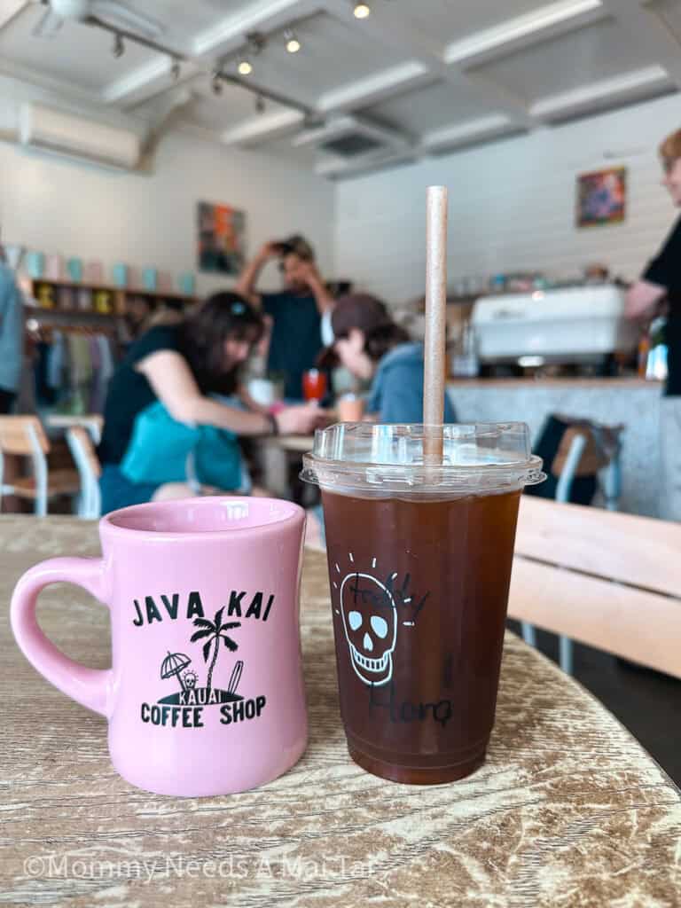 Two coffees sitting on a table side by side at Java Kai in Kapa'a, Kauai 